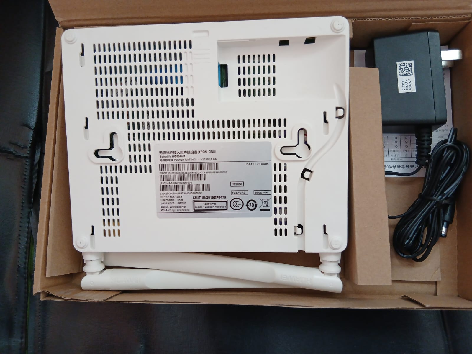 Huawei Dual Antenna GPON WiFi Router with Power Adapter – High-Speed Fiber Internet Modem 2 Huawei GPON fiber modem with original power adapter – dual antenna wireless router for PTCL, StormFiber, Nayatel